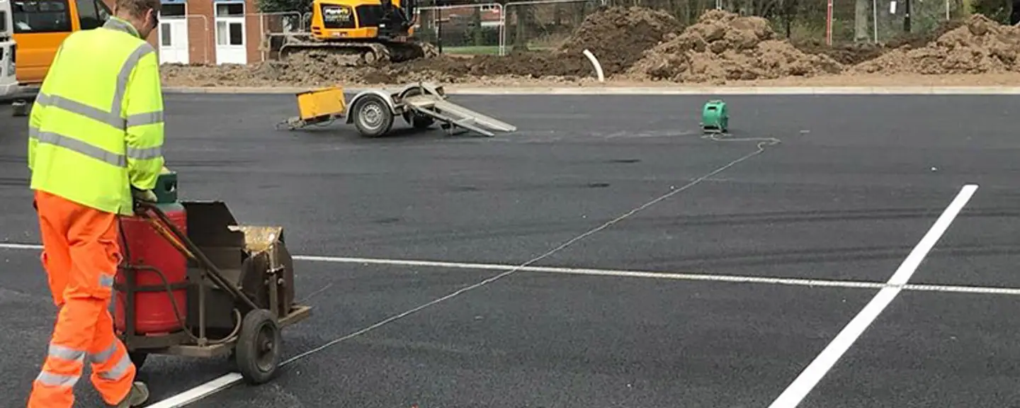 Fresh line marking across a resurfaced car park — Car Park Resurfacing in Staines by Meads Resurfacing