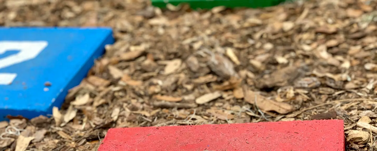 Numbered play markings on a soft play surface — Playground Resurfacing in Bexley by Meads Resurfacing