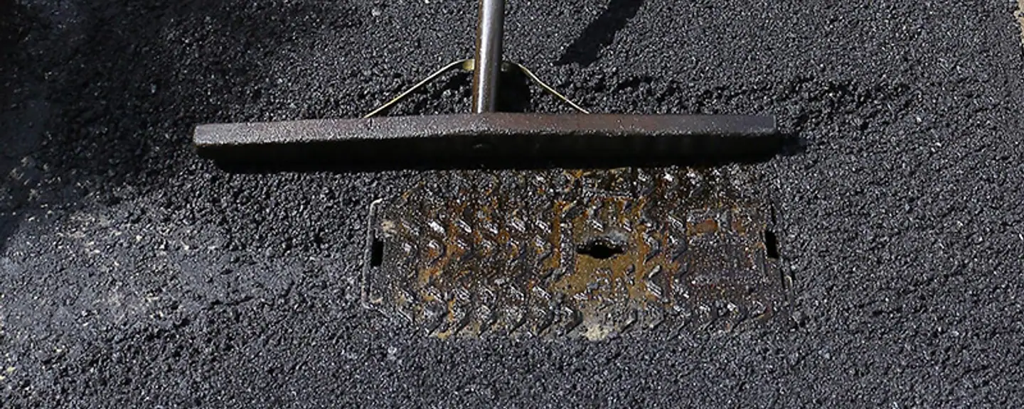 A pothole filled with standing water before repair — Pothole Repairs in Dover by Meads Resurfacing