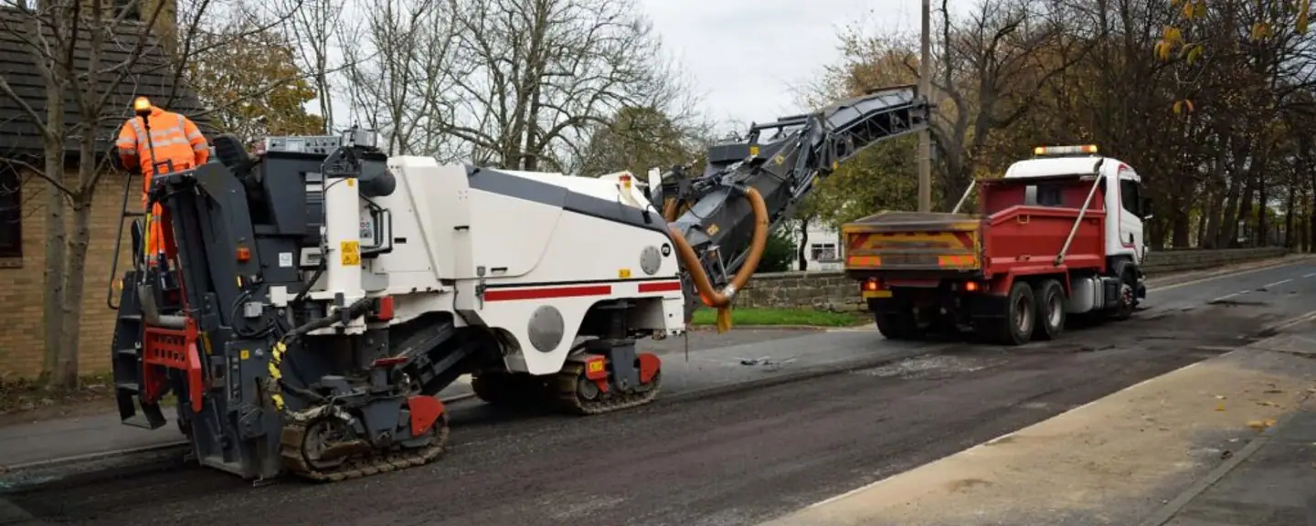 Asphalt milling ahead of a permanent repair — Pothole Repairs in Lambeth by Meads Resurfacing