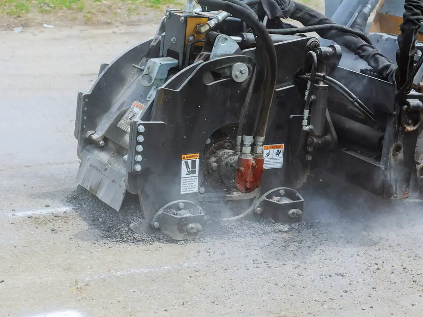 A milling machine planing out a failed surface