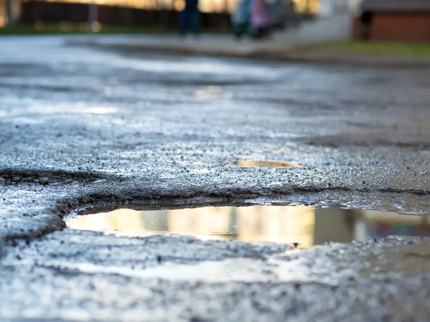 An emergency repair to a broken asphalt edge