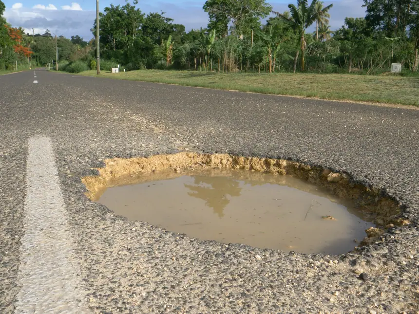 Cracked asphalt in need of repair
