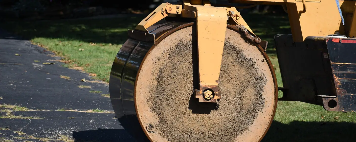 A roller wheel bedding in a tarmac repair — Tarmac Contractors in Millwall by Meads Resurfacing