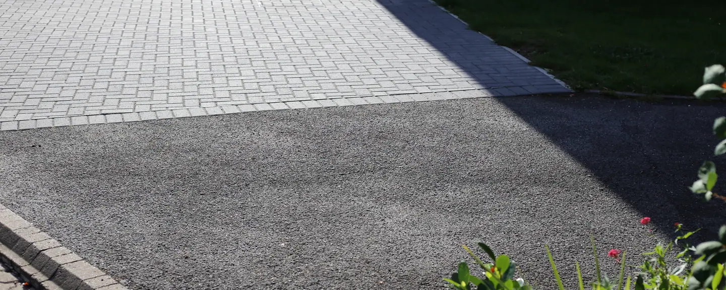 A tarmac driveway edged with block paving — Tarmac Driveways in Ruislip by Meads Resurfacing