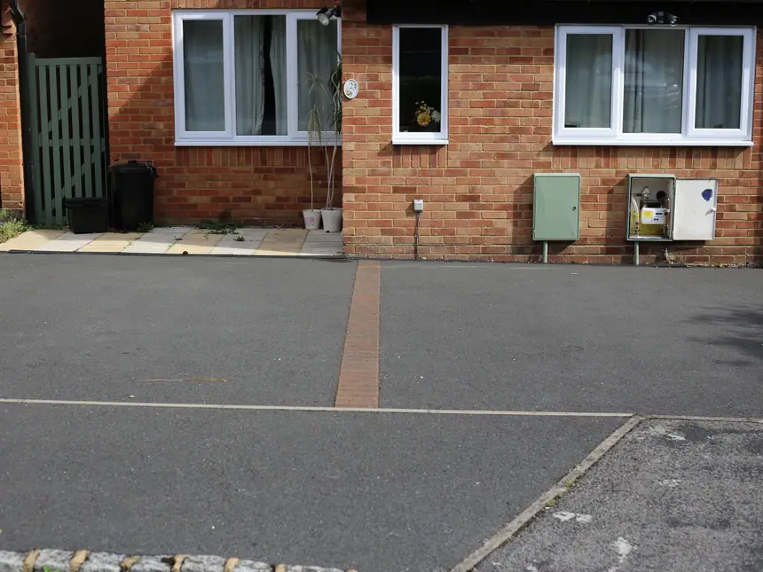 A tarmac driveway finished with edging